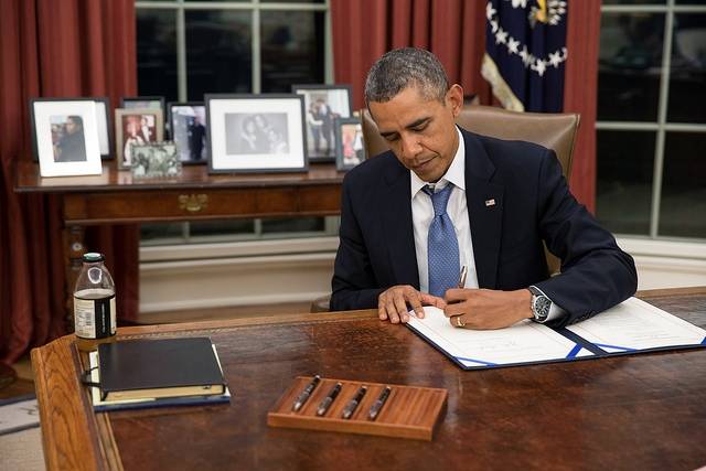 Obama signs another goddamn Obamacare apology letter.